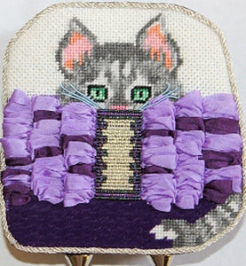 Grey Kitten In Purple Clutch